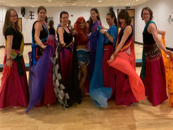 Belly dance themed hen do dance class Leeds - bride and friends performing Middle Eastern dance routine